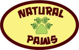 Logo for Natural Paws, pawprint with hawaiian flowers.